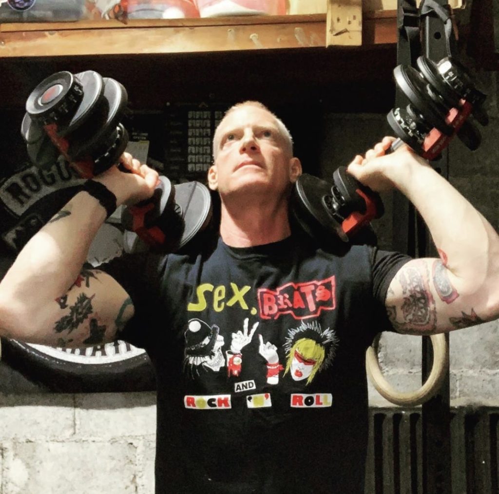 johnny working with dumbbells