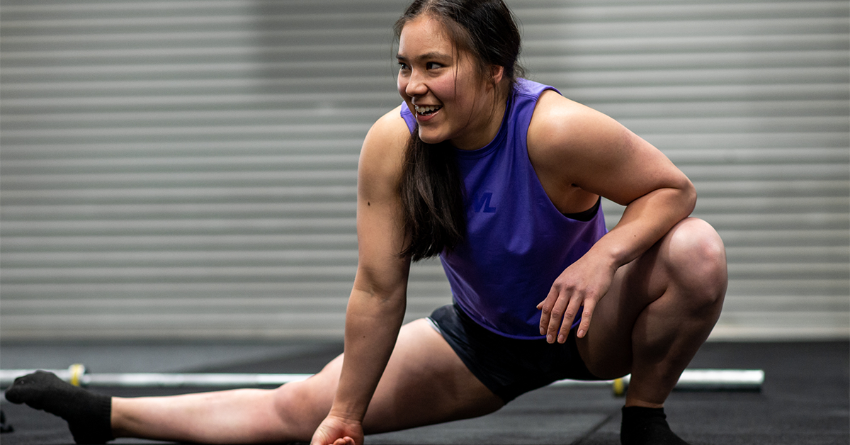 female athlete stretching