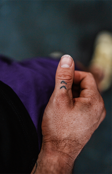 khan porter double arrow tattoo