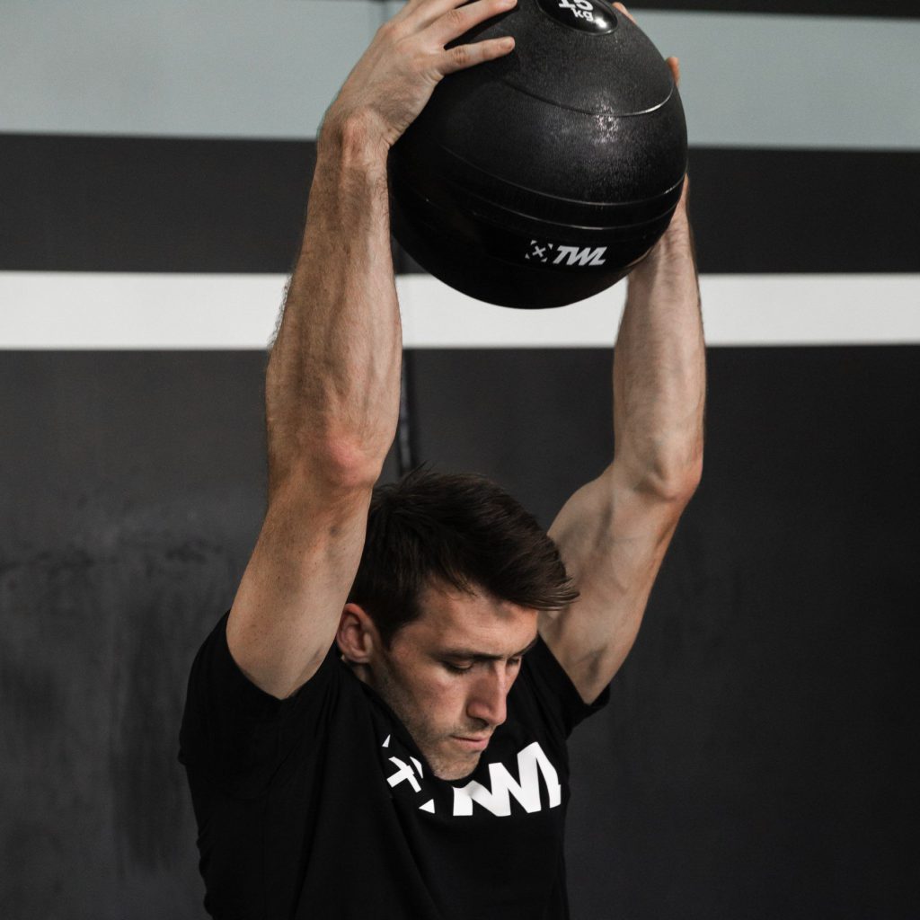 athlete doing slam ball throws