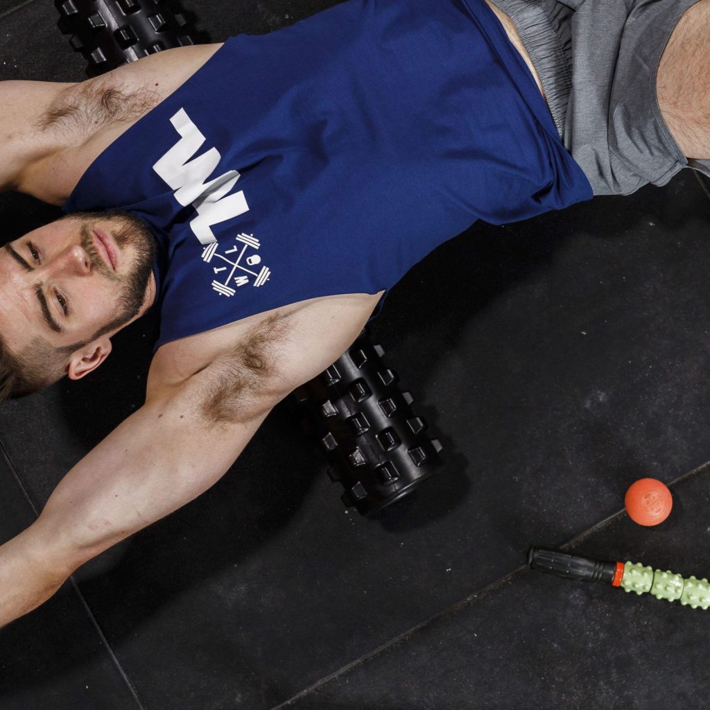 athlete on foam roller for trigger point relief