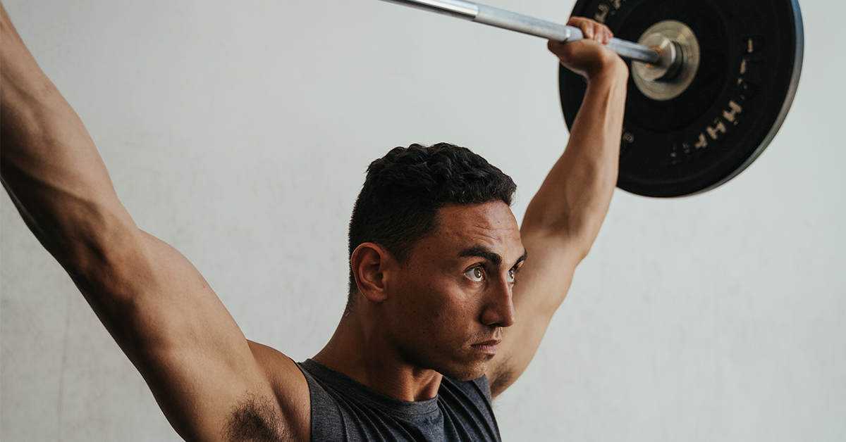 athlete practicing overhead squat form