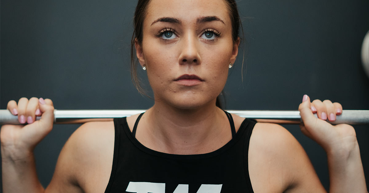 female athlete back squat every day