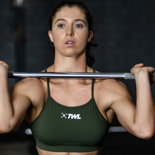 female athlete doing barbell front squat