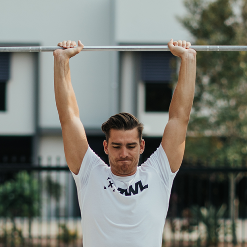 male athlete doing push press