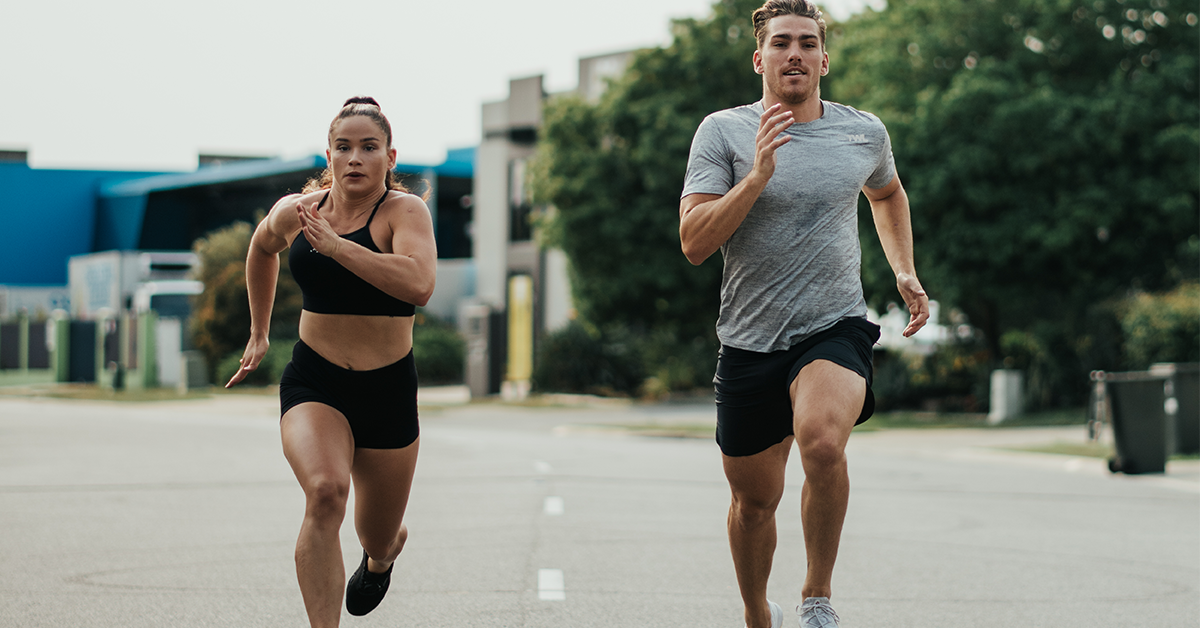 two athletes doing partner WOD