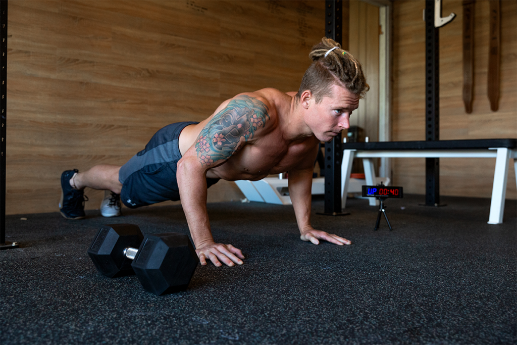 James Newbury workout out at home gym
