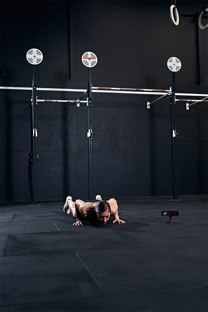 female athlete practicing how to do burpees faster