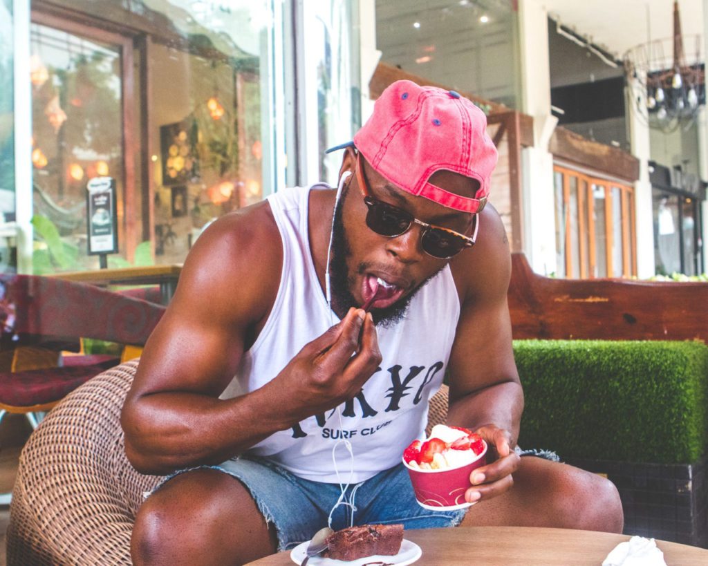 man eating frozen yogurt