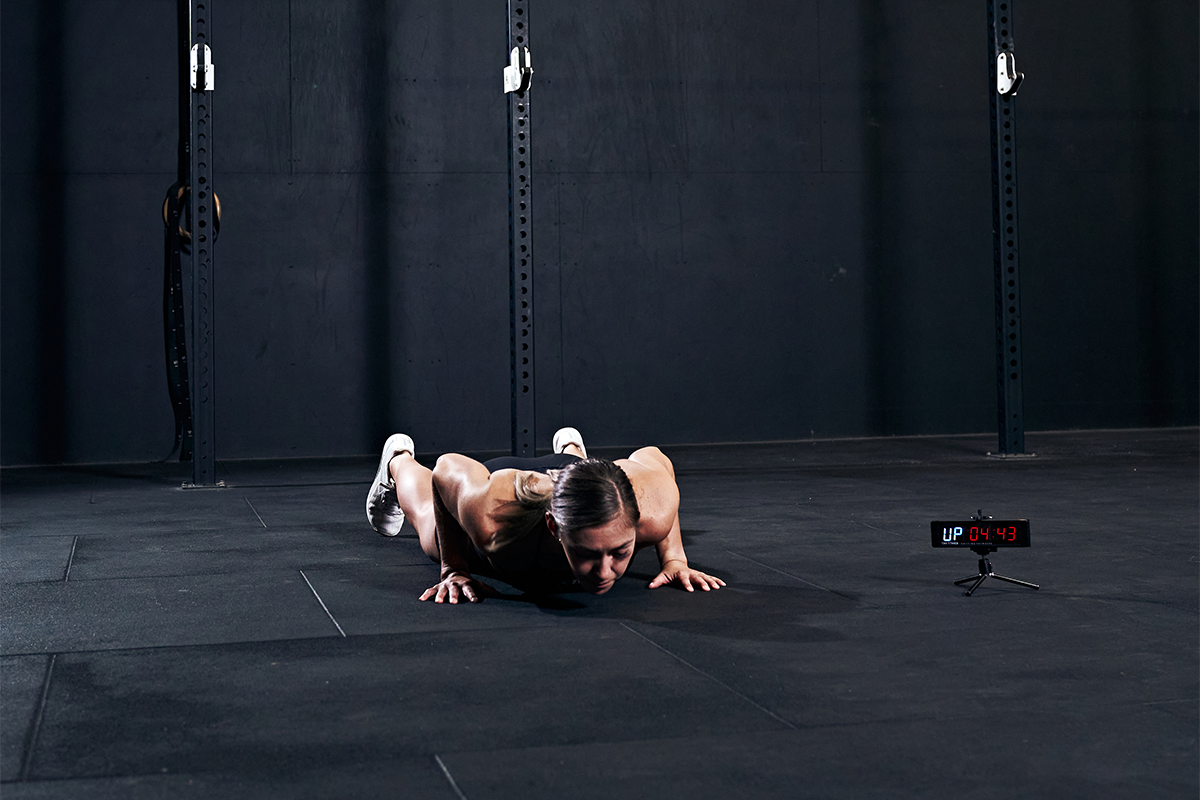 female athlete doing bodyweight pushups
