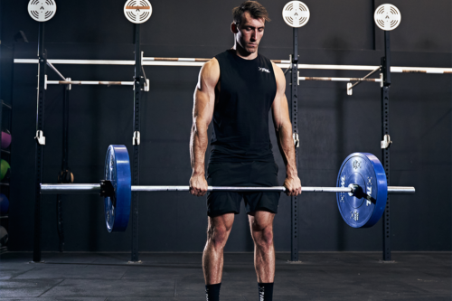 athlete doing deficit deadlift